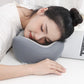 Ergonomic U-shaped Neck Pillow providing relief from neck and shoulder discomfort for hotel guests.